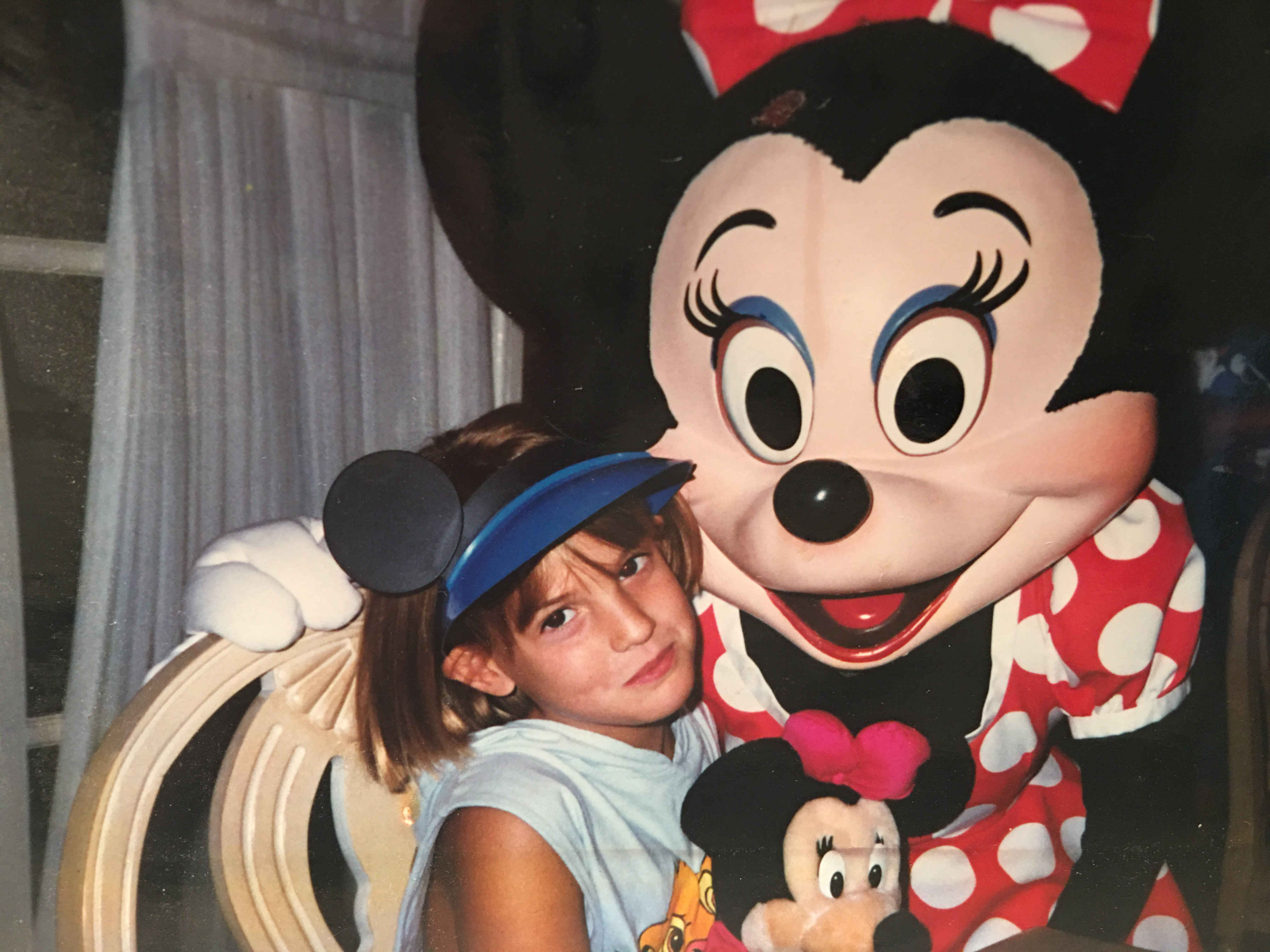 Young Annie hanging out with Minnie Mouse